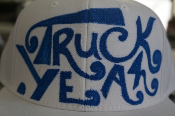 truck yeah hat white halfway