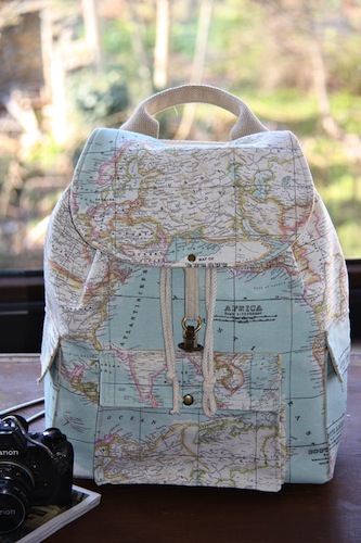 world map traveler backpack